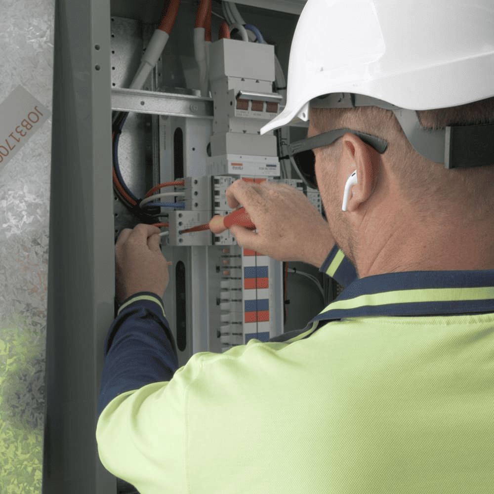 Preventative Electrical Maintenance - Man working in a strata building